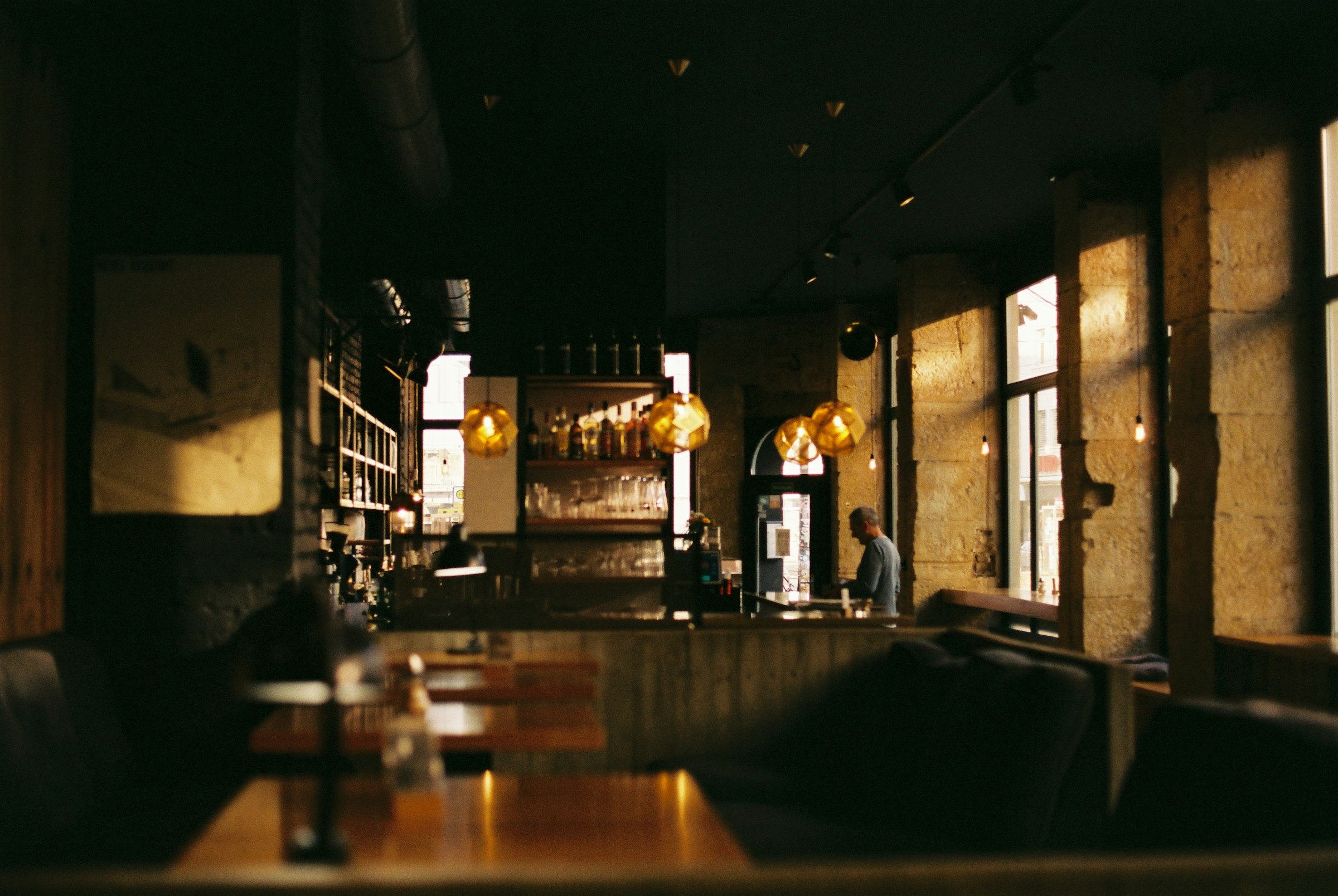 Dimly lit restaurant dining room